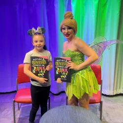 Mila and her mom, provide books to cardiac families to promote development in the hospital.
